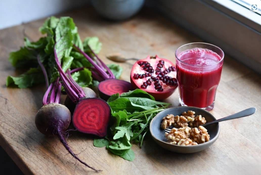 Beets, leafy greens, pomegranate and walnuts, natural nitric oxide foods that support blood flow for erectile health